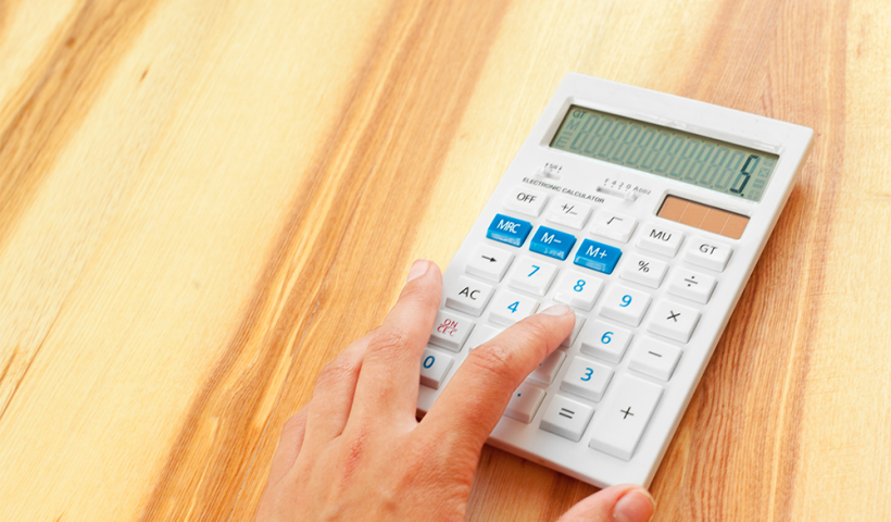man using calculator